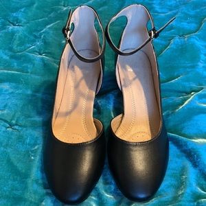 Like new! Black Size 10 rounded toe wedge heels with thin ankle strap